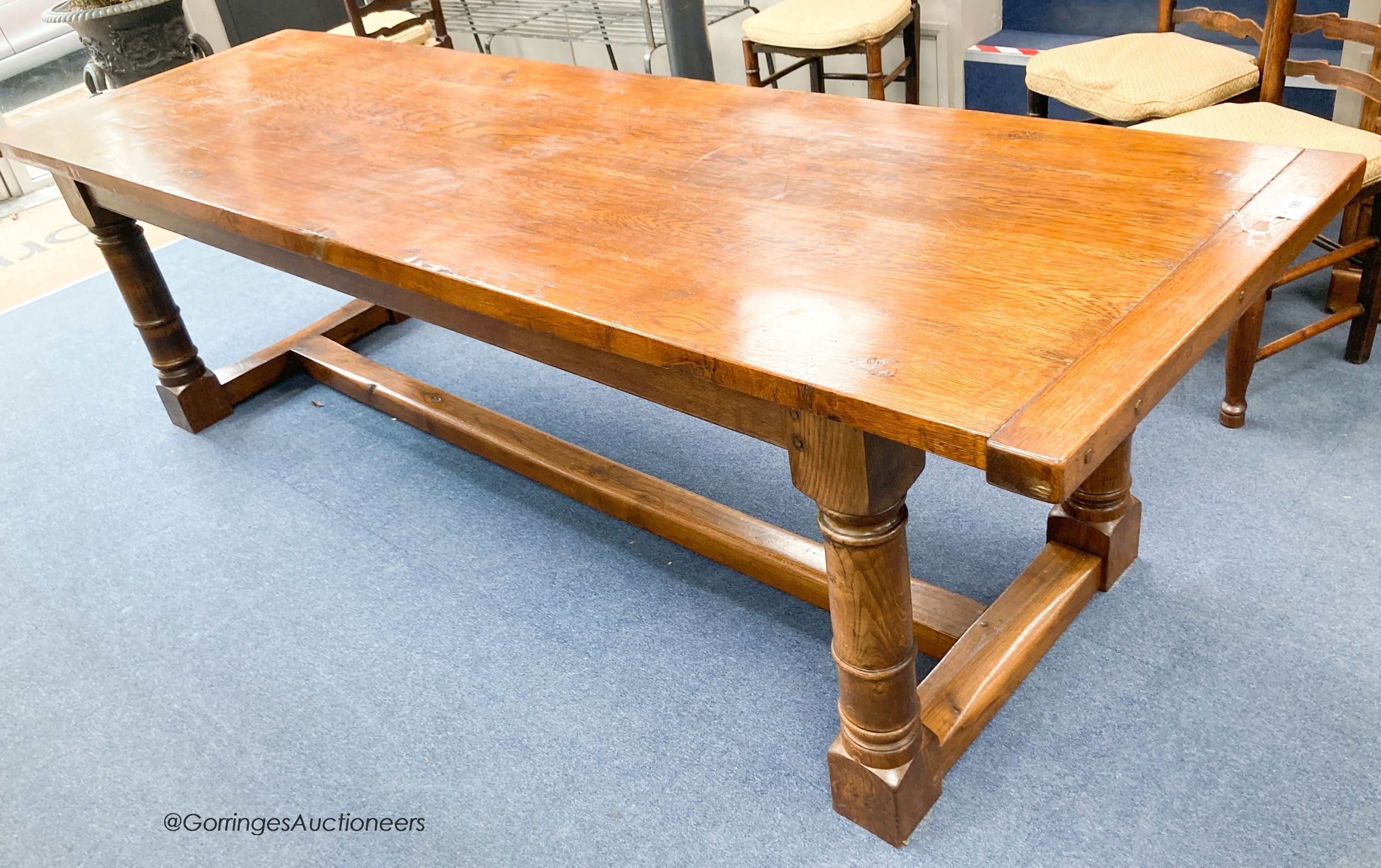 An 18th century style rectangular oak refectory dining table, length 274cm, depth 85cm, height 78cm